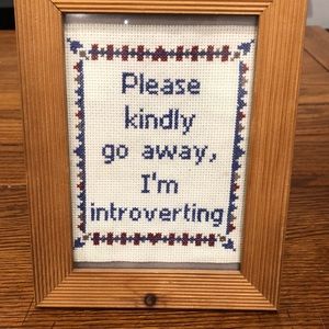 Hand-embroidered framed sign